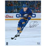 Dylan Cozens Buffalo Sabres Autographed 16" x 20" Blue Jersey Skating with Puck Photograph